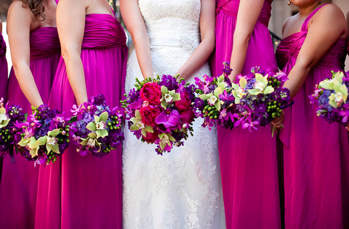 hot-pink-bridesmaids-dresses-long-tropical-bouquets.original
