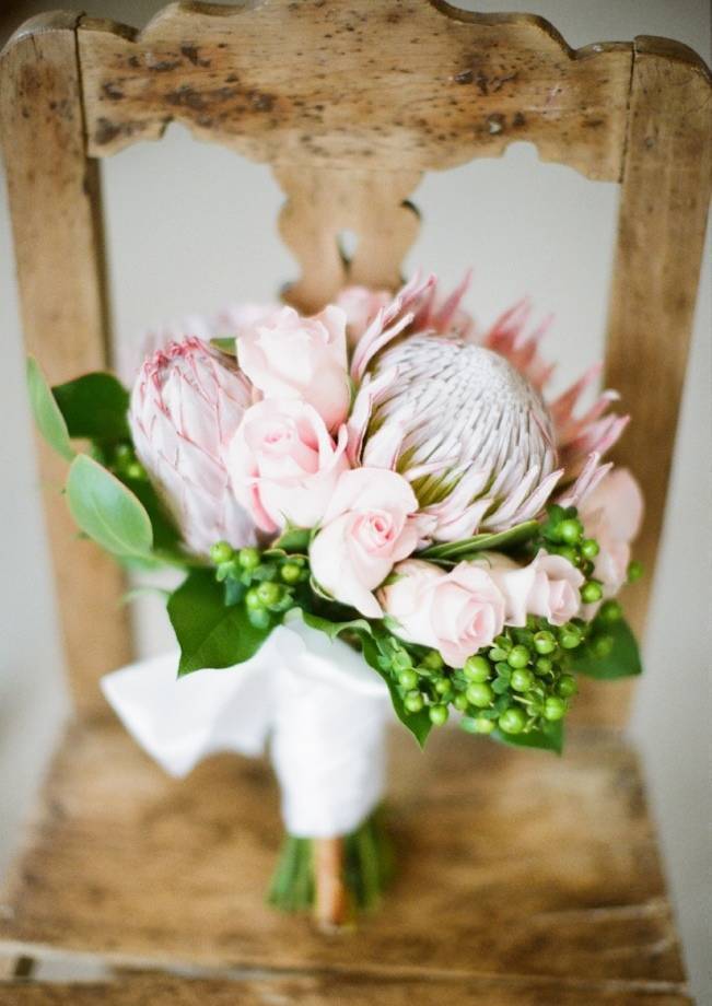 pink protea and rose bouquet