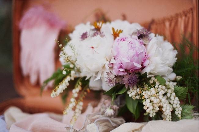 pink peony and lily of the valley bouquet