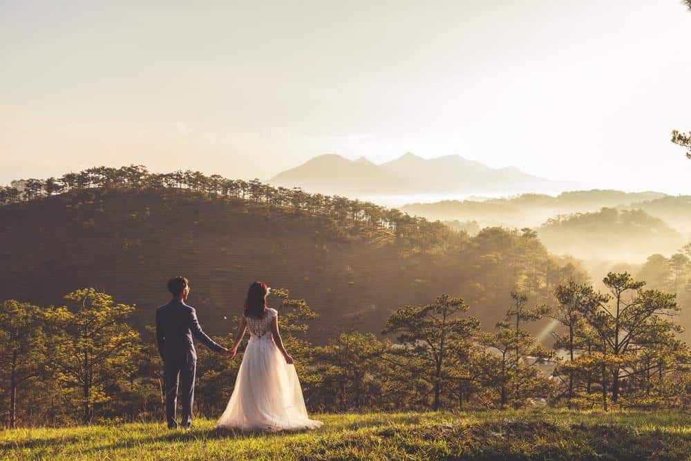 man and woman holding there hands