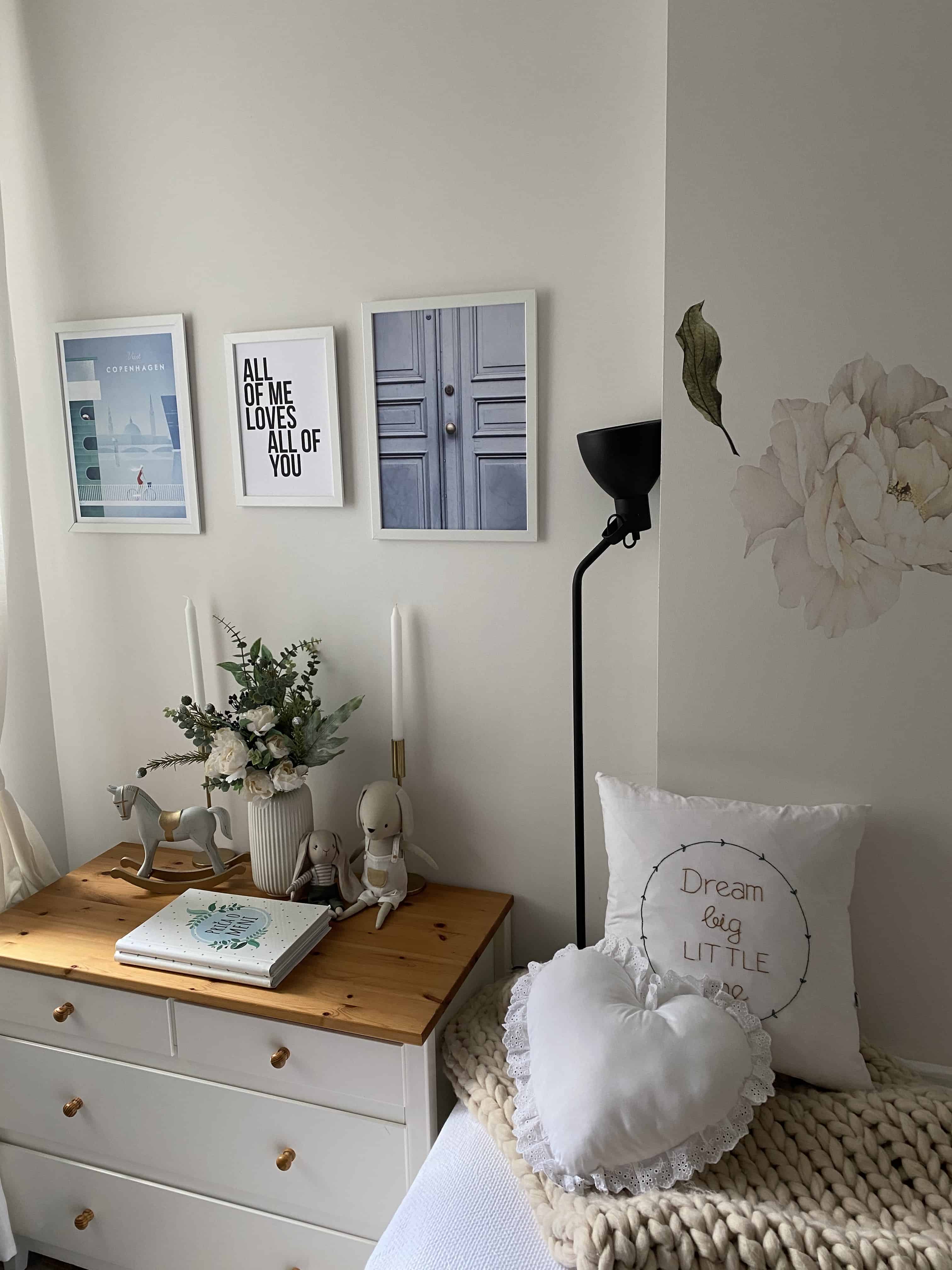 white and black table lamp on brown wooden table