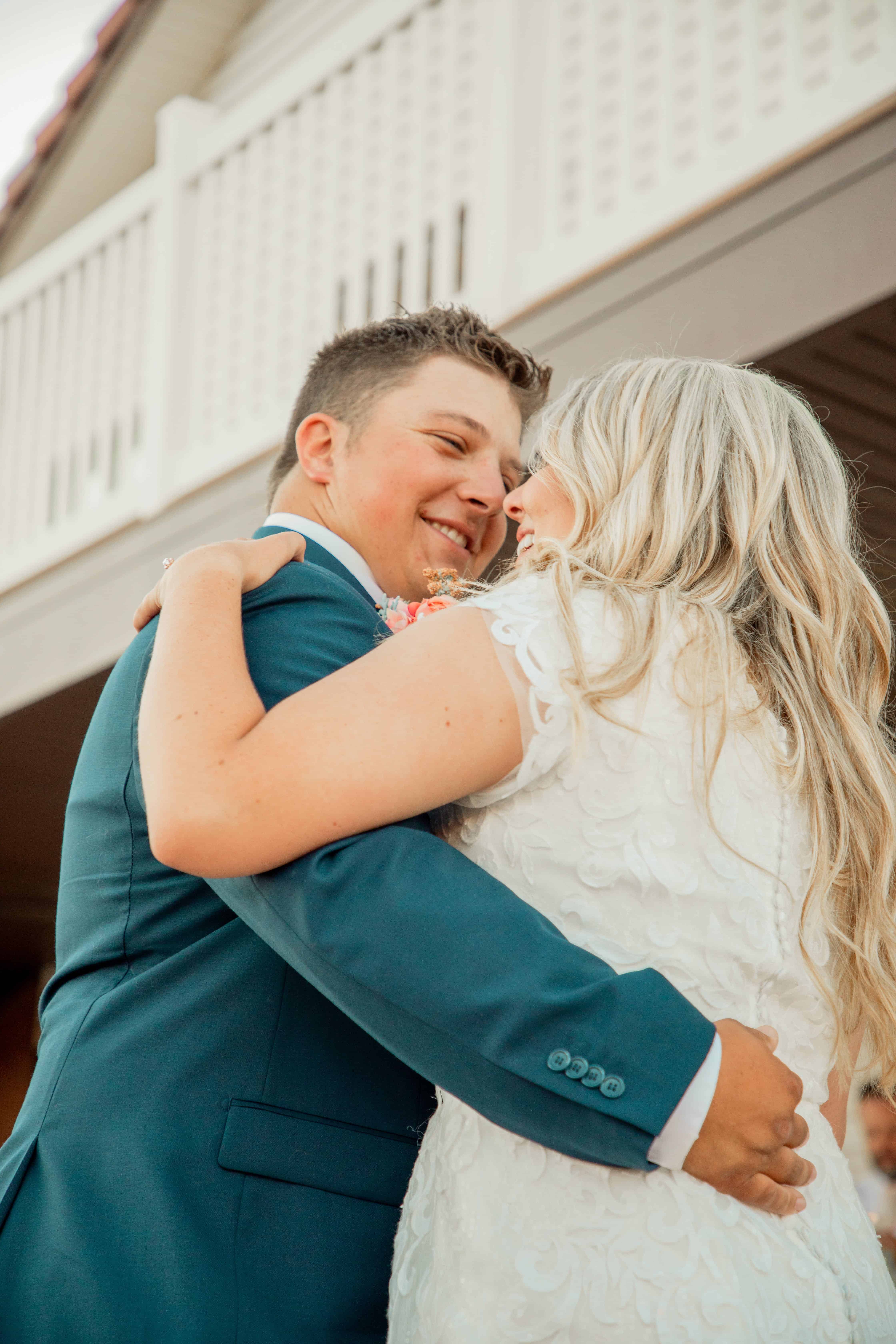 Free Groom and Bride Hugging and Smiling Stock Photo