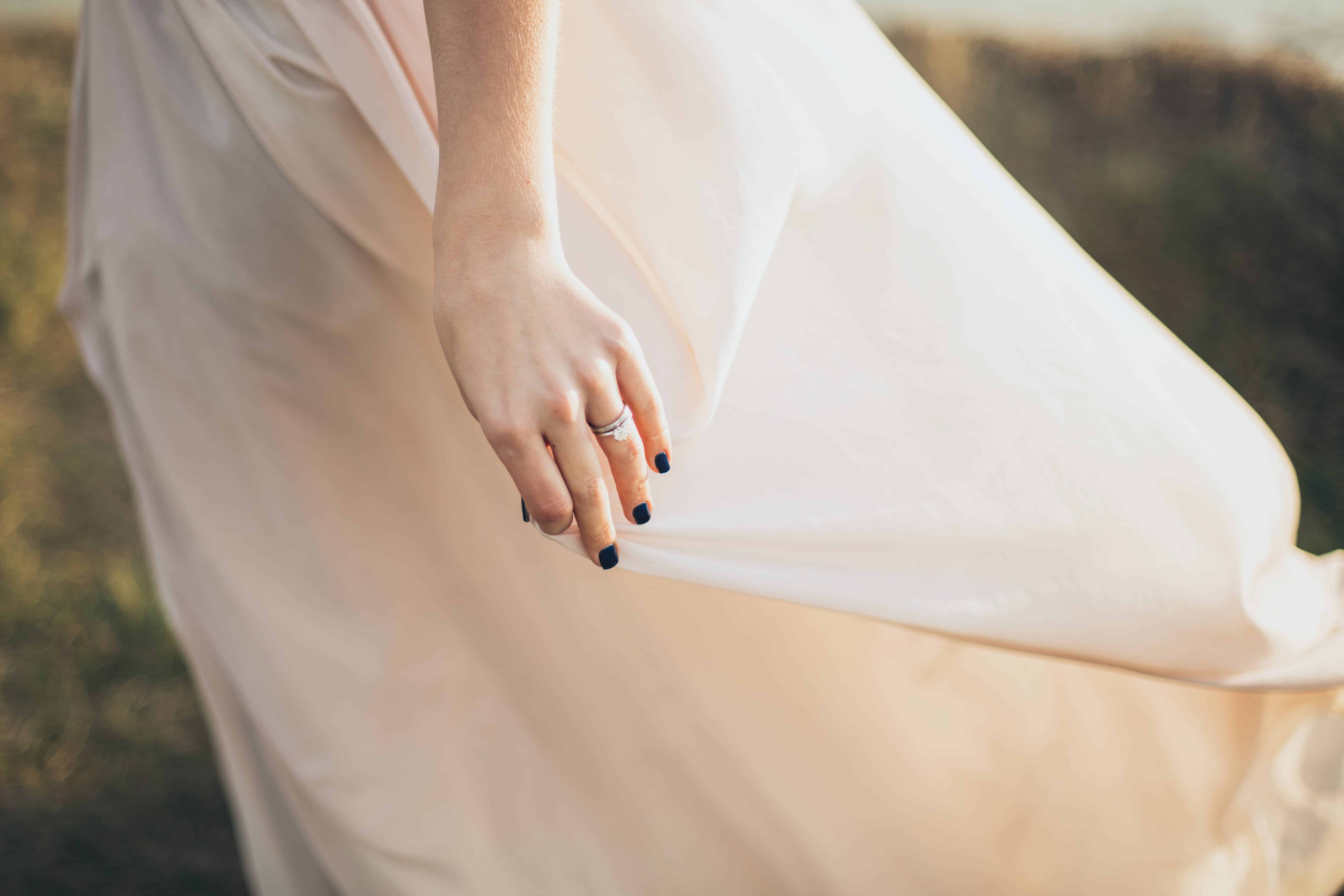 Free Woman Wearing White Dress With Black Manicure Stock Photo