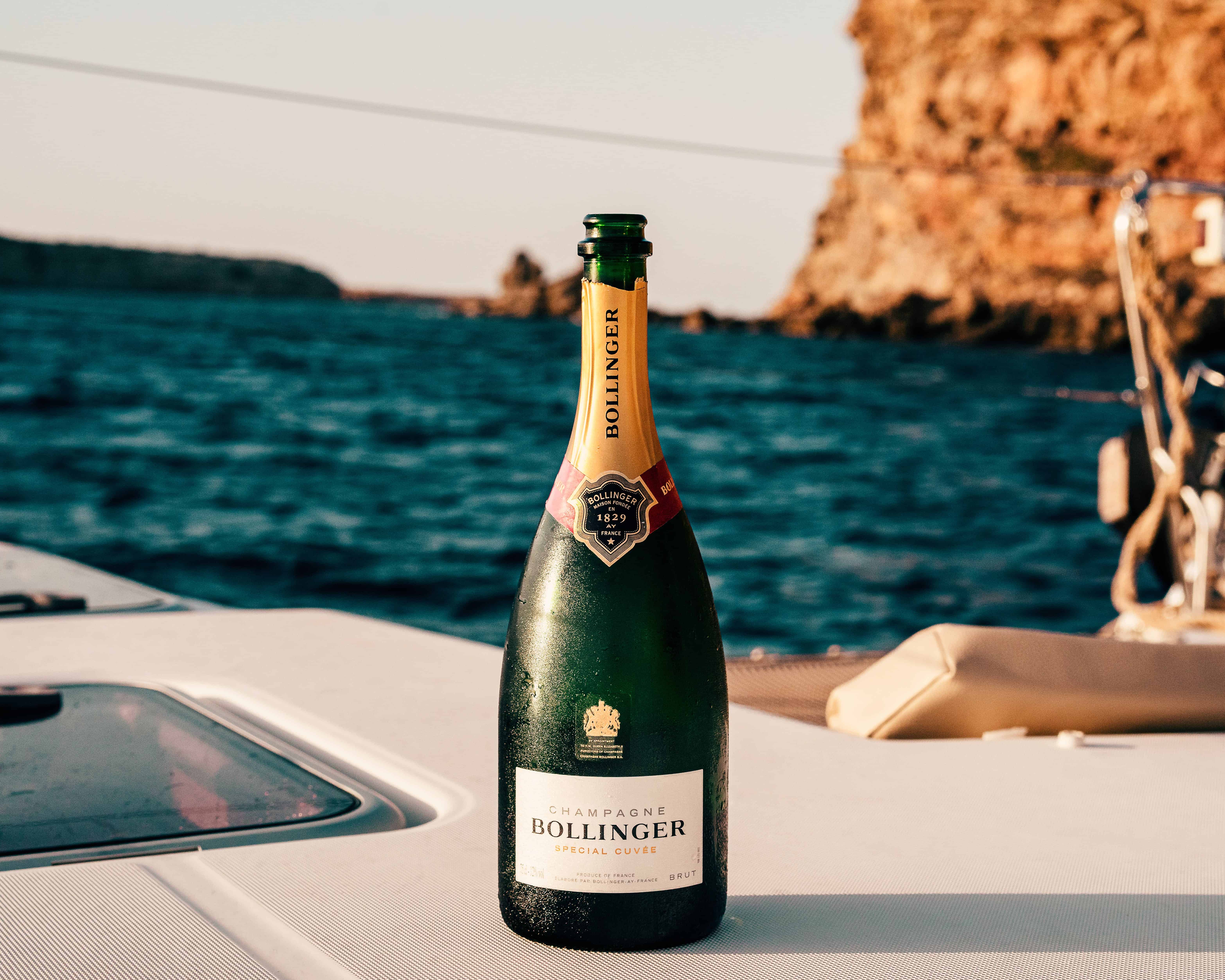 Free Bollinger Wine Bottle on Boat Stock Photo