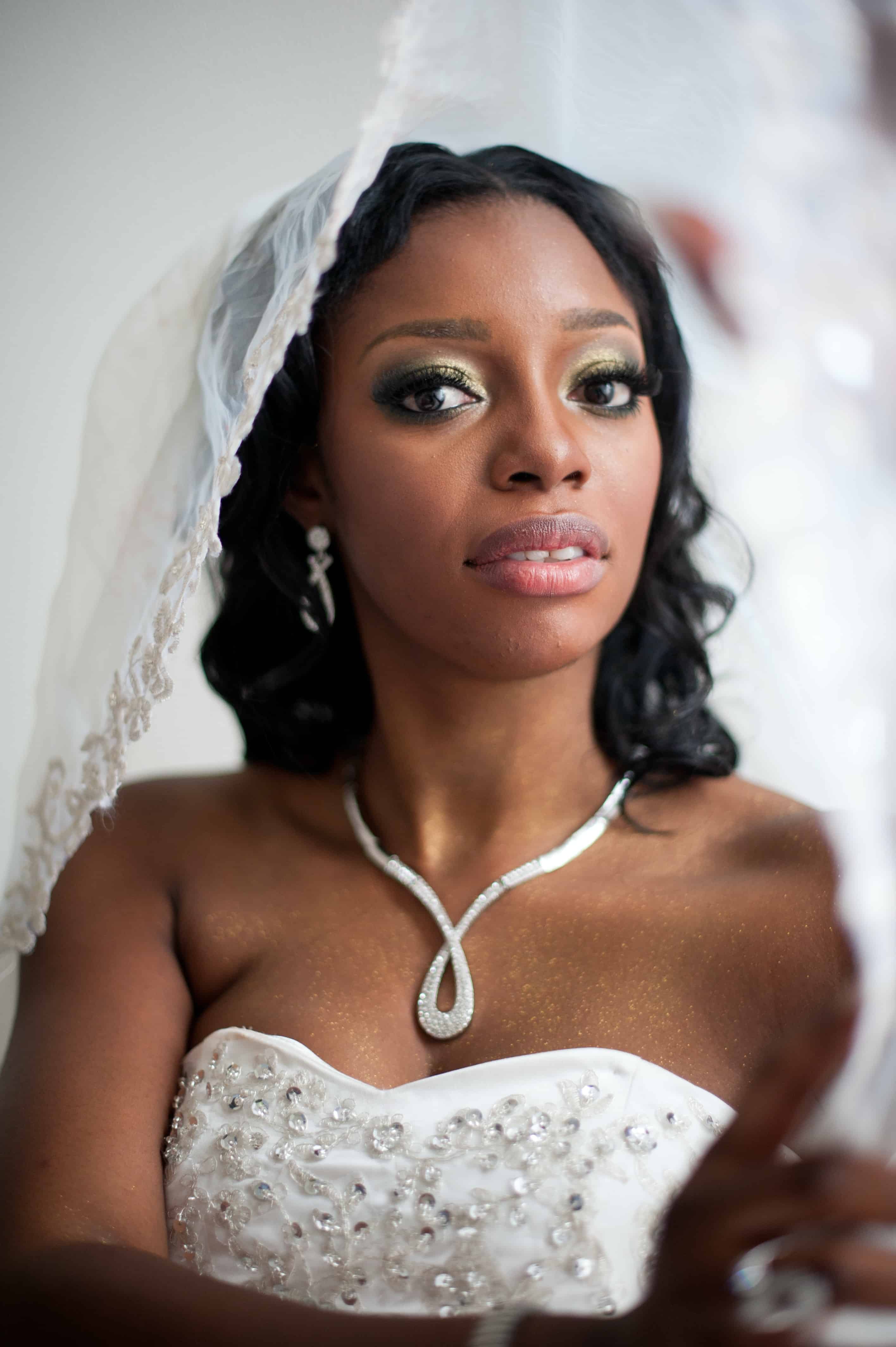 selective focus photo woman wearing wedding veil